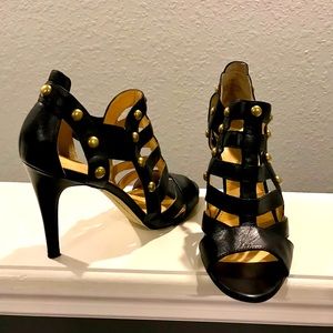 Boutique 9 black leather cage heels w/ gold accent